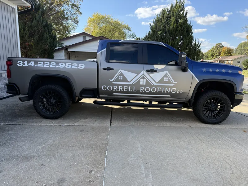 Correll Roofing Silverado HD in a driveway